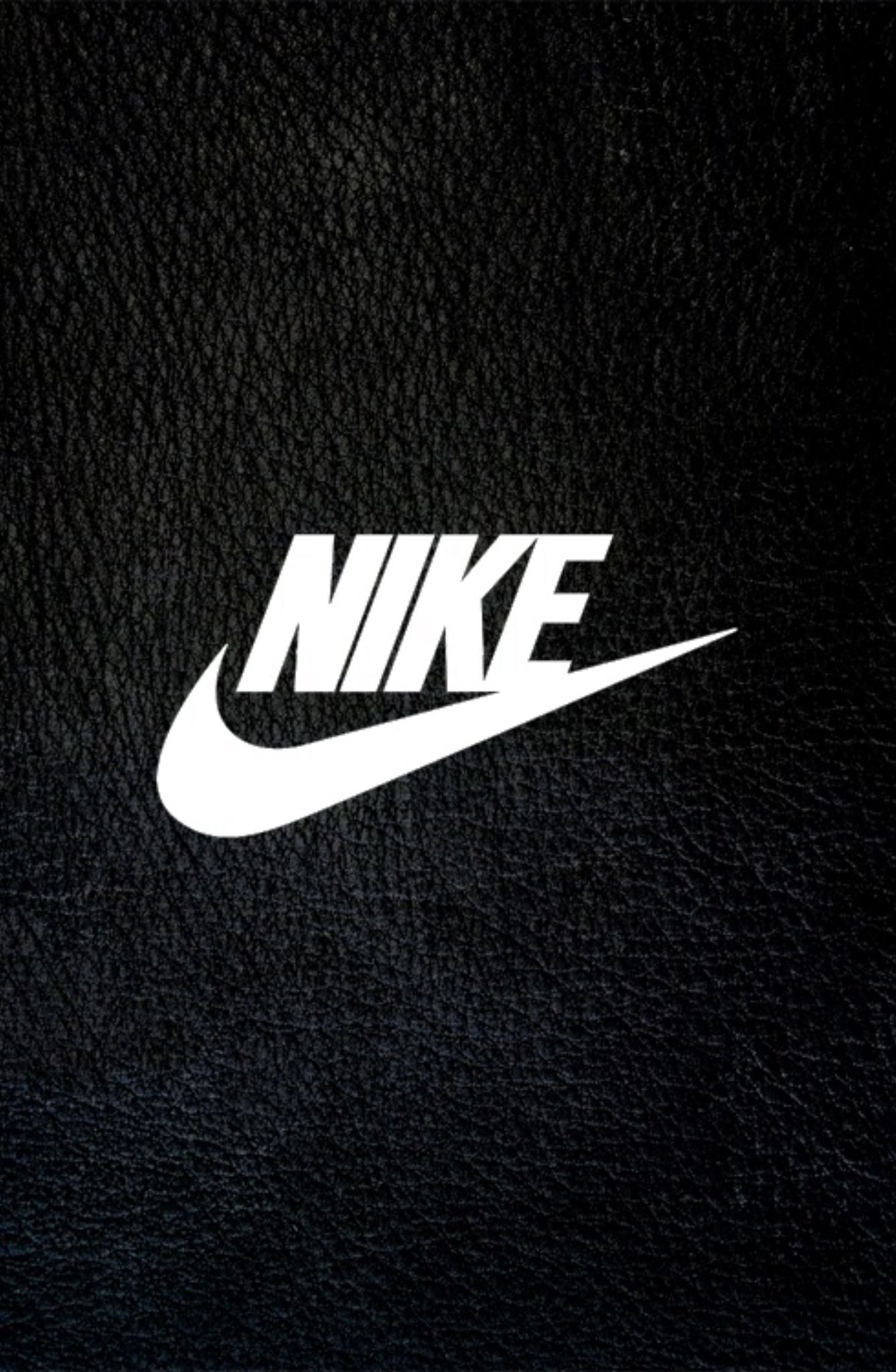 Тема найк. Обои Nike. Найк на черном фоне. Найк логотип. Логотип найк на черном фоне.