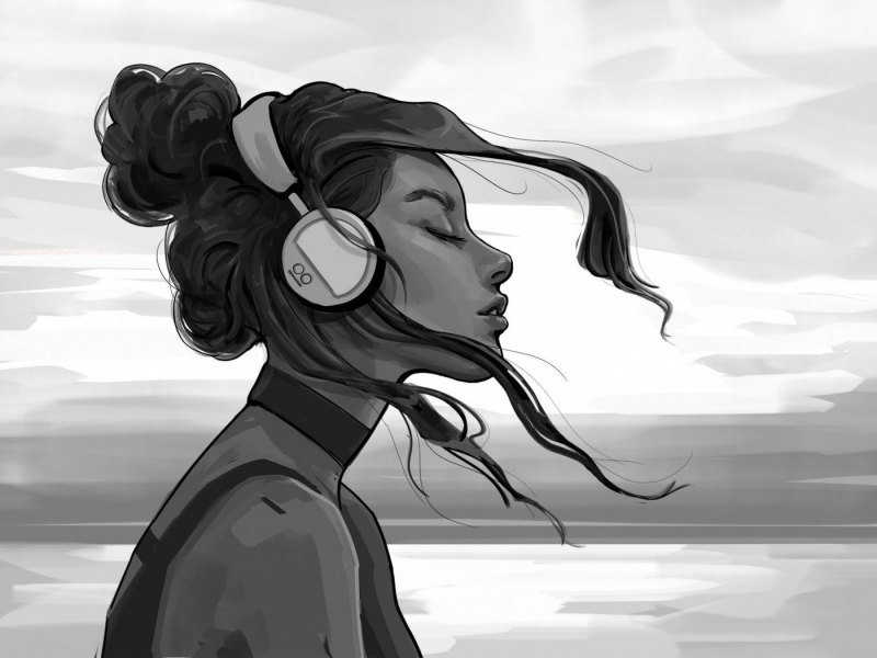 Грустная девушка в наушниках