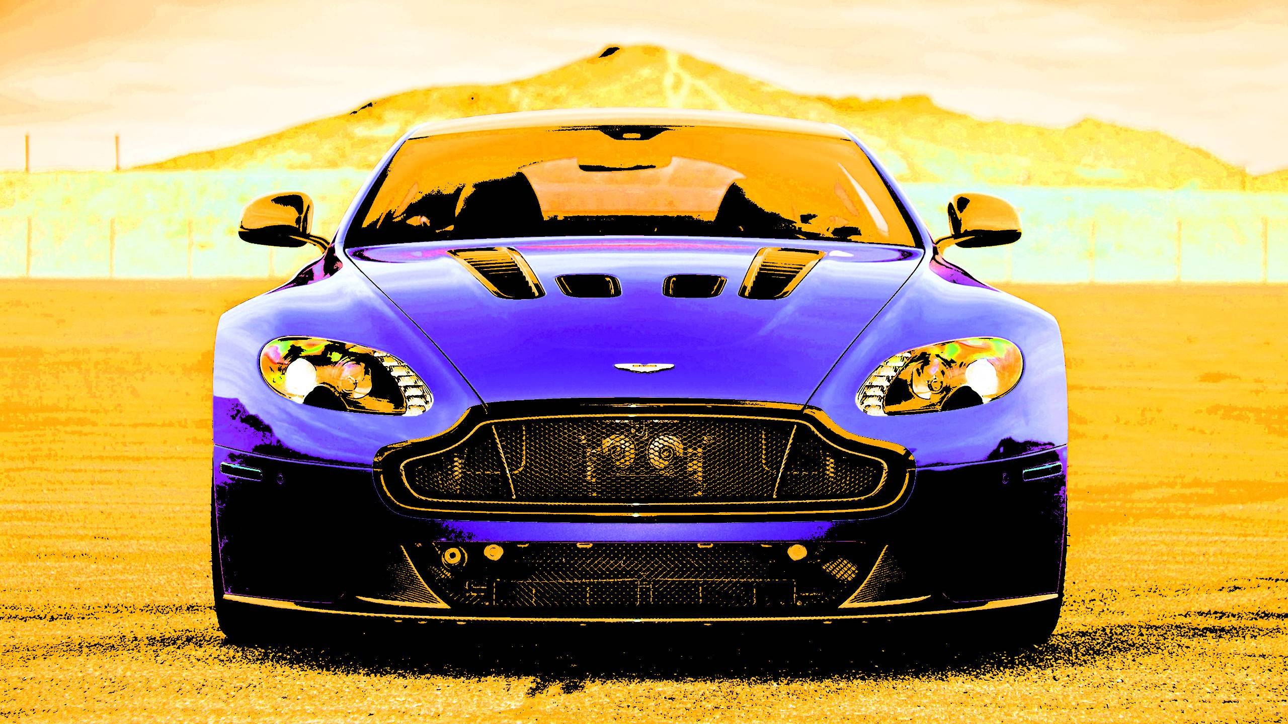 Аватарки на телефон машины. Aston Martin v12 Vantage. Фон Aston Martin v12. Фон Aston Martin v8. Обои на телефон автомобили.
