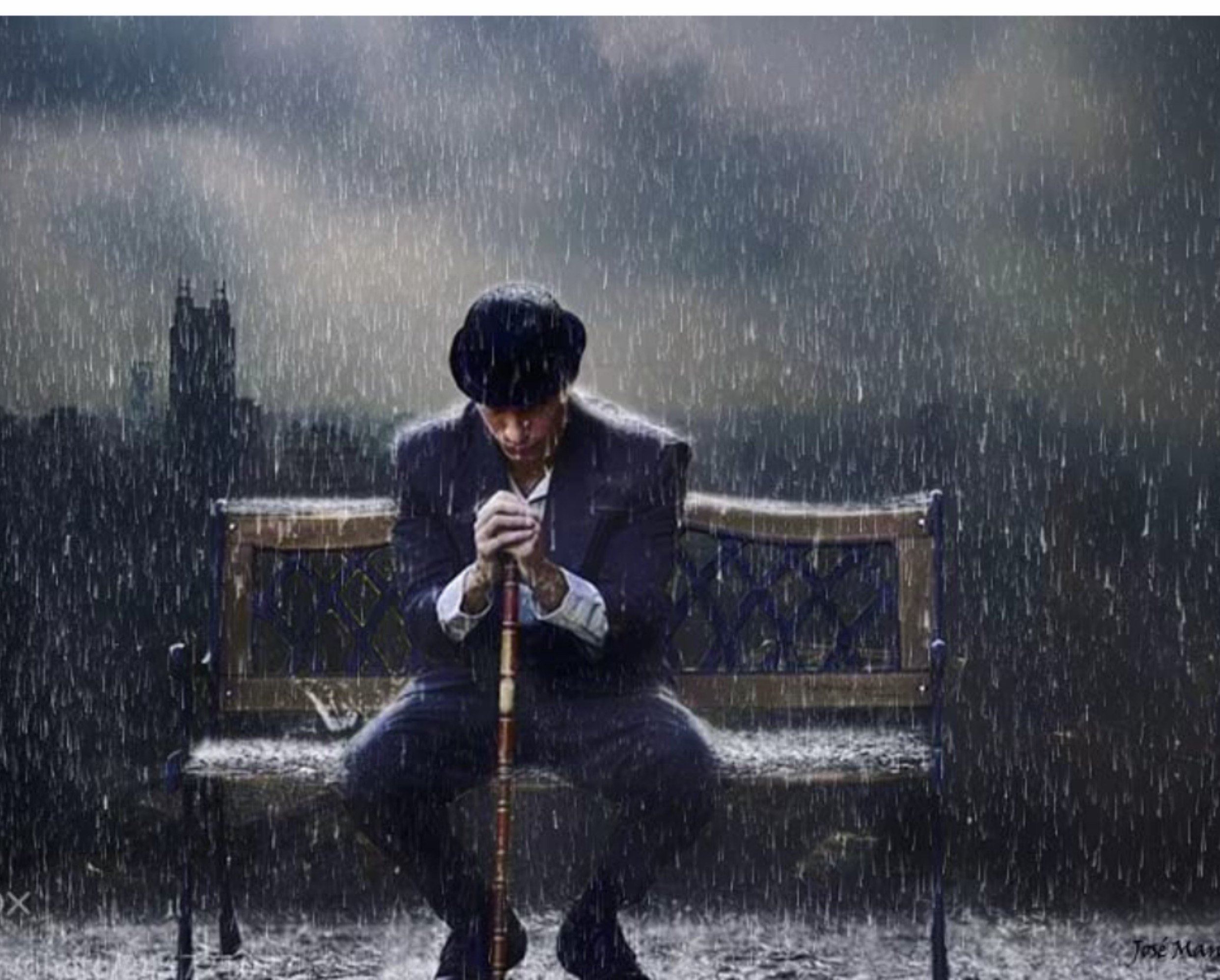 Одинокм парень под дождём
