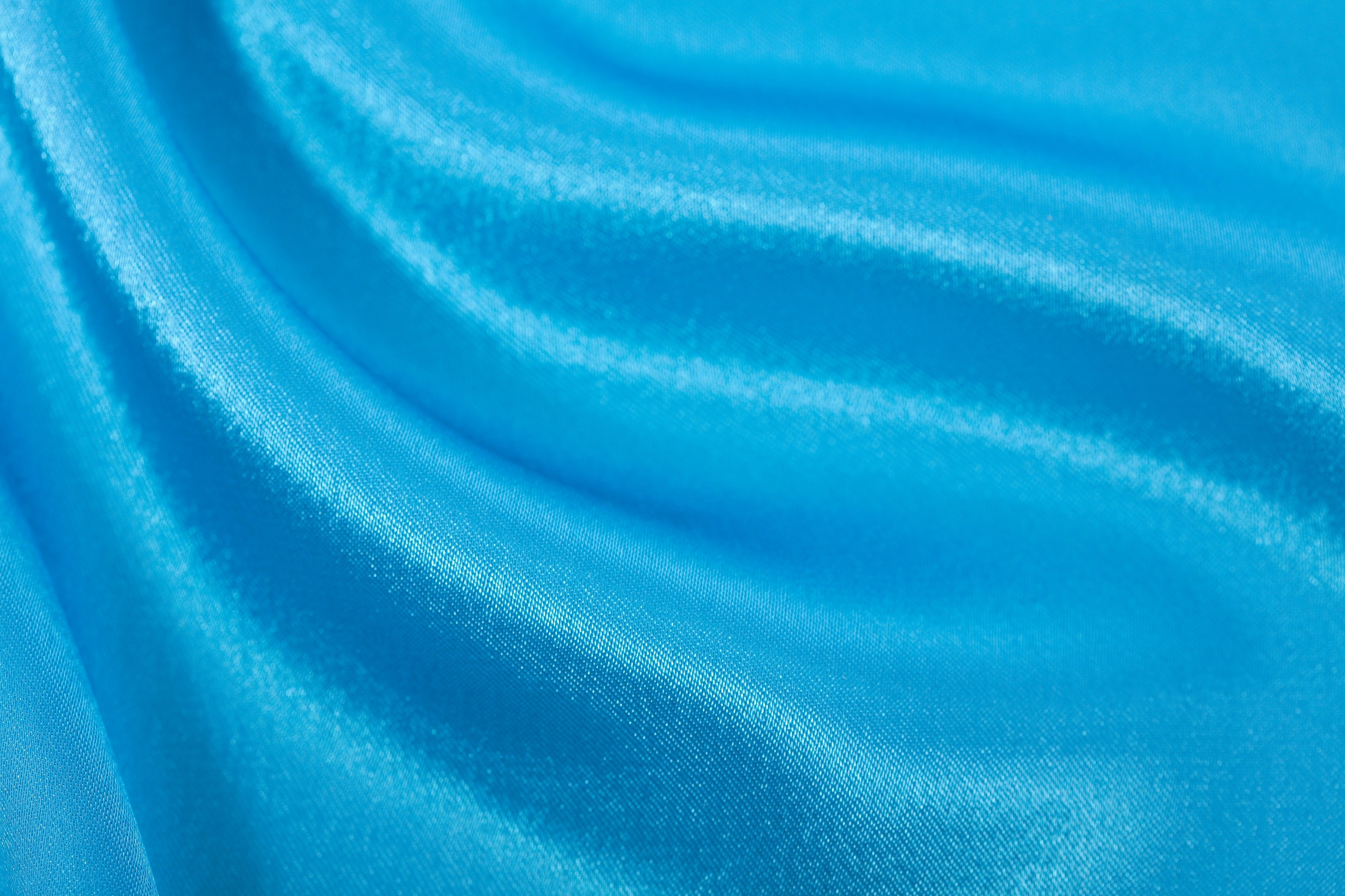 Полотно голубые. Синяя ткань. Голубой шелк. Фон ткань. Голубая атласная ткань.