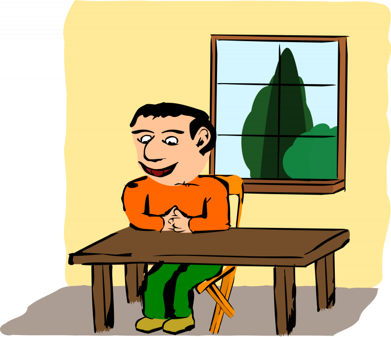 Сидячий за столомчеловек