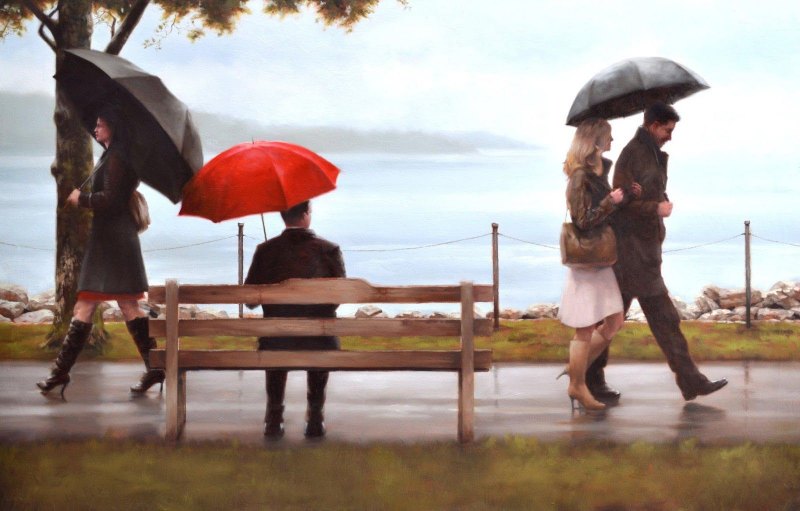 Человек с зонтом под дождем